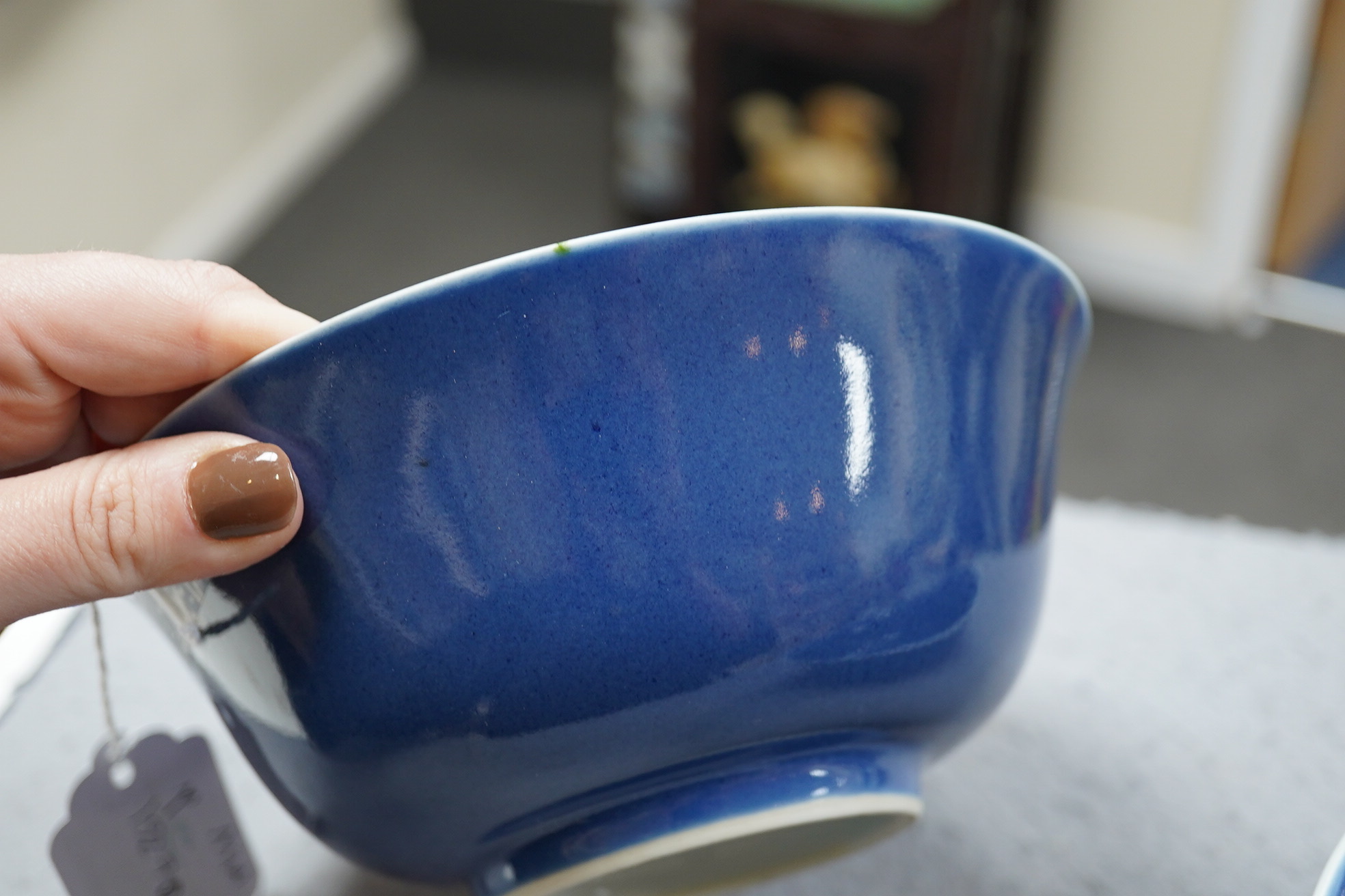 A pair of Chinese powder blue glazed bowls, Daoguang mark and of the period (1821-50)